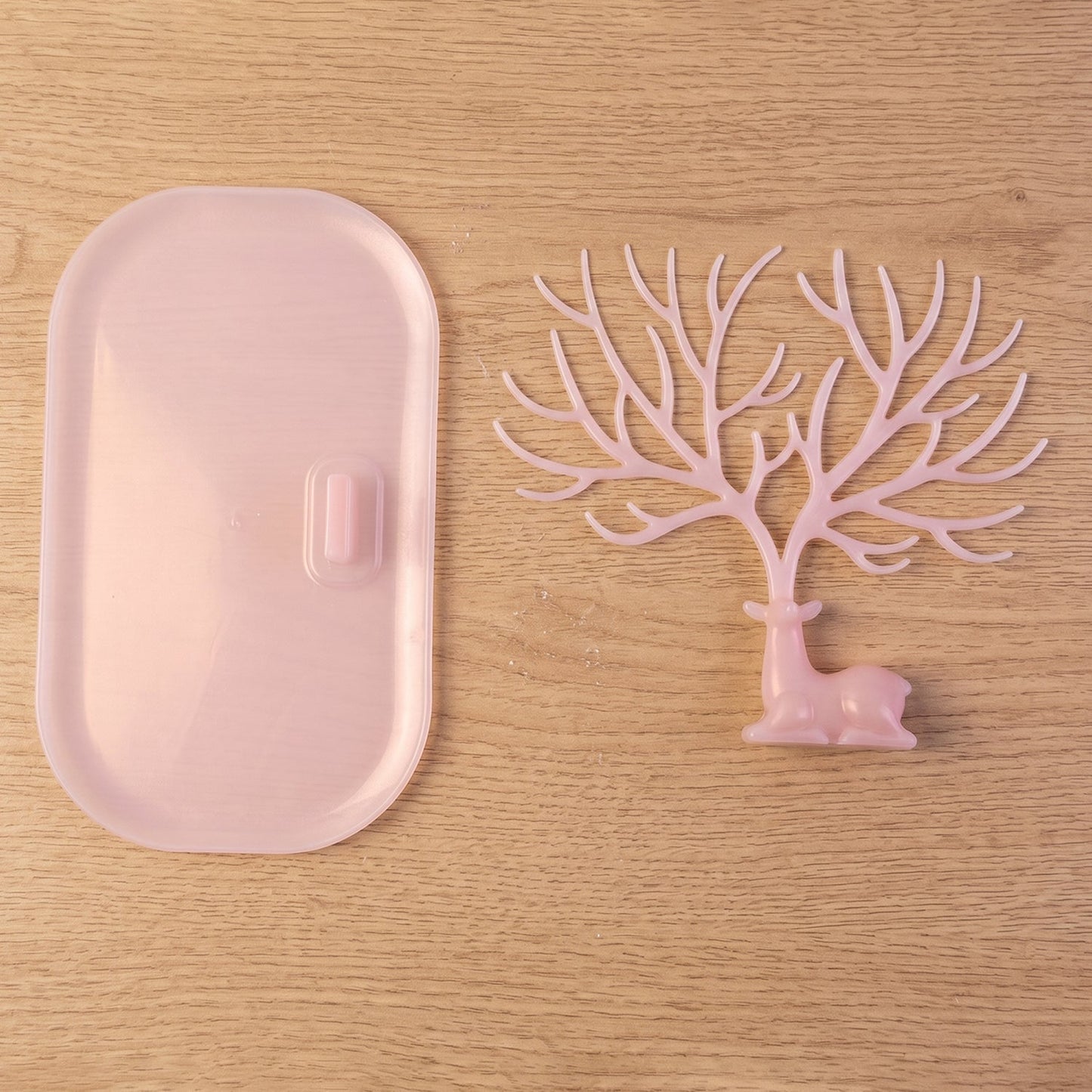 Large pink deer antler stand with earrings India